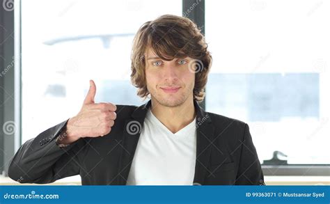 Thumbs Up by Casual Businessman in His Office Stock Image - Image of business, strength: 99363071