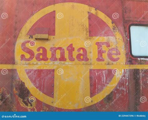 Close Up of Faded Santa Fe Railway Logo on Side of Rusted Rail Car ...