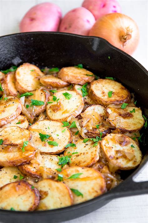 LYONNAISE POTATOES: French roasted potatoes with caramelized onion