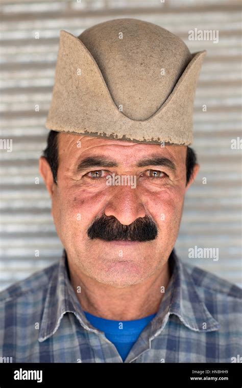 Adult man of Qashqai people with traditional felt hat, Kavar, Fars, Iran Stock Photo - Alamy