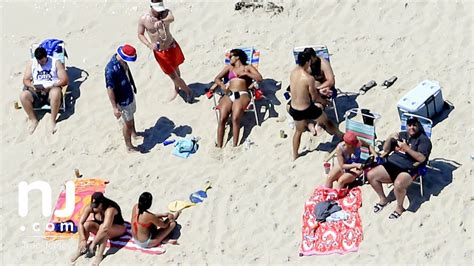 Chris Christie, family soak up sun on state beach he closed to public - YouTube