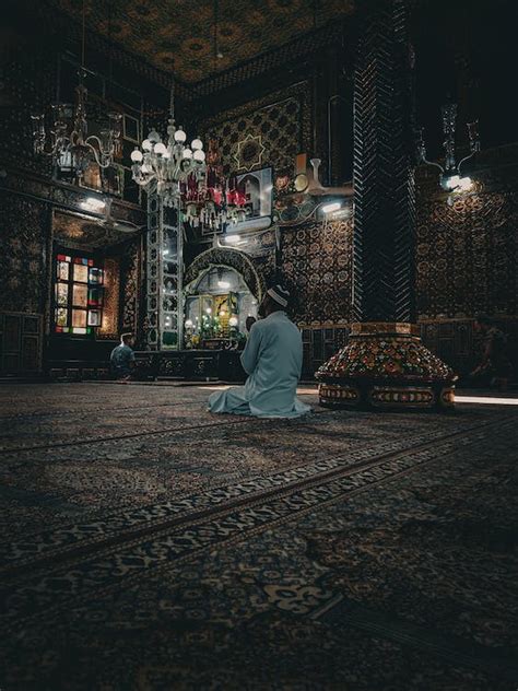 A Man Praying Inside the Temple · Free Stock Photo