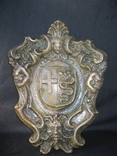 Bronze coat of arms of the Visconti family, depicting the - Catawiki