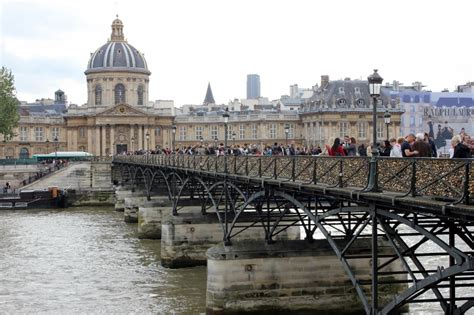 Put a Love Lock on Pont des Arts Bridge in Paris