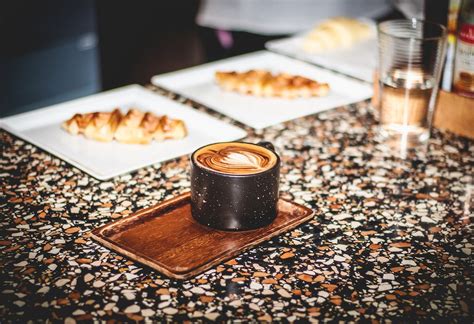 Photo of a Black Cup with Coffee · Free Stock Photo