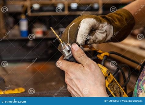 Blacksmith Changing a Drill Bit Stock Image - Image of craftsperson, industry: 154030067