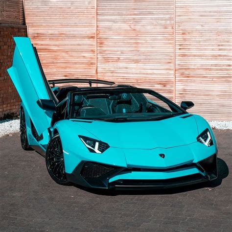 Teal Lamborghini with Butterfly Doors