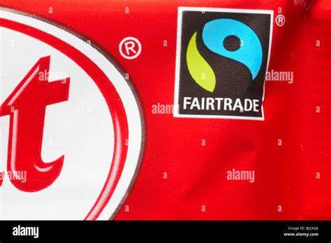 Fairtrade logo on KitKat chocolate bar wrapper - Fairtrade logo symbol Fair Trade Stock Photo ...