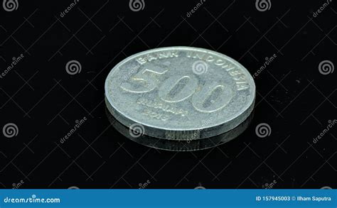 Indonesia Rupiah Coins Close Up on Black Background with Reflection ...