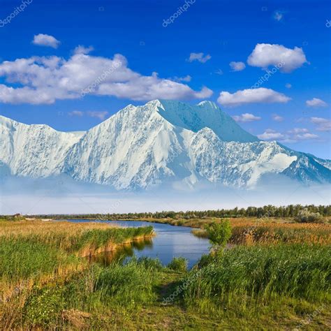 Majestic mountains beyond a prairies — Stock Photo © york_76 #10756892