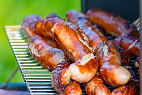 Brat Sausages are Grilled on the Charcoal Grill Stock Photo - Image of ...