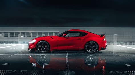 Download Side View Of Red Supra Toyota 4K Wallpaper | Wallpapers.com