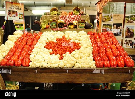 Canadian flag made of fresh vegetables and fruits, economy concept for fresh fruits and ...