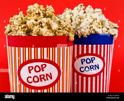 food aliment corn pop snack popcorn red two blue food aliment salt object Stock Photo - Alamy