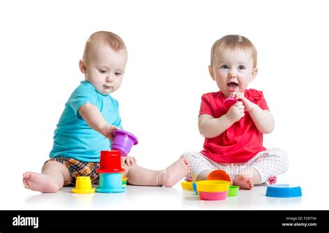 Children playing with toys on floor Cut Out Stock Images & Pictures - Alamy