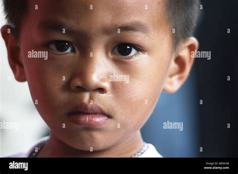 boy in temple at the grand palace in bangkok thailand south east asia Stock Photo - Alamy