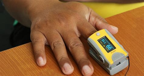 FDA reviews evidence pulse oximeters less accurate on people with ...