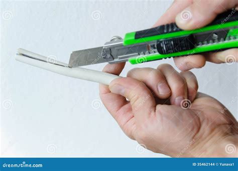 Electrician Stripping White Wire Stock Photo - Image of installing ...