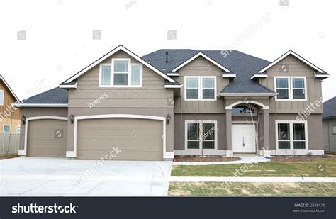 Brown Two Story House With Three Car Garage Stock Photo 2828428 : Shutterstock