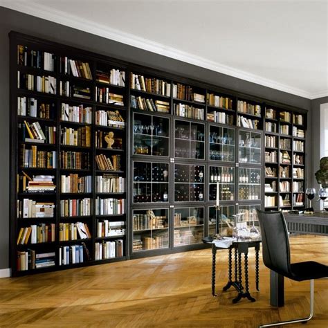 Furniture. large black wooden Library Bookshelves with many racks on brown wooden floor ...