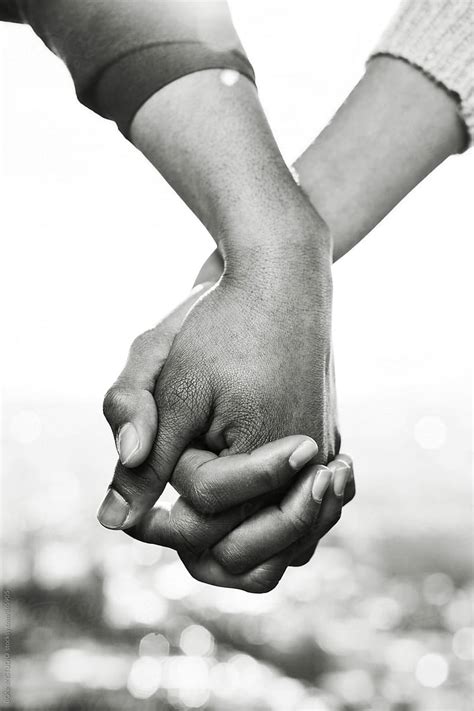 "Closeup Of Couple Holding Hands Outside. Black And White Photo." by Stocksy Contributor ...