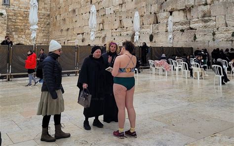 Woman strips down to swimsuit at Western Wall in apparent protest of ...