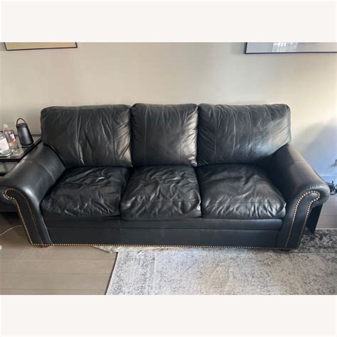 Designer Guild Black Leather Pull Out Couch - AptDeco