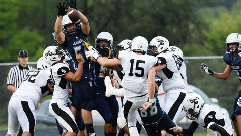 Lightning football rallies for season opening win