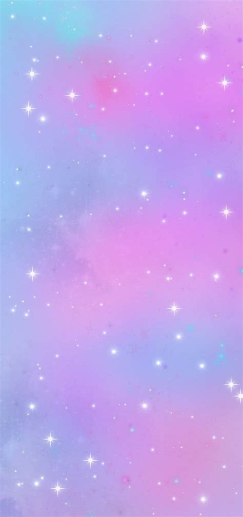 the sky is filled with stars and pink, blue, and purple hued clouds