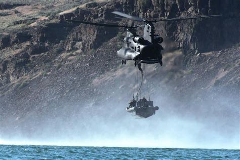 US Army Helicopter Drops An Entire Boat Full Of Navy Seals In The Sea | Gizmodo Australia