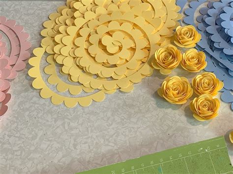 How To Make A Paper Rose + Free Rolled Flower Template | Paper rose template, Paper flower ...