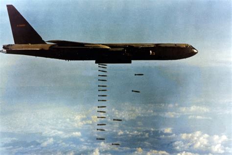 Bomber dropping bombs in Operation Linebacker during the Vietnam War ...