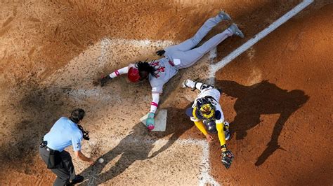 Elly De La Cruz steals 2nd, 3rd and home in 2-pitch span, sparks Reds to 8-5 win over Brewers ...