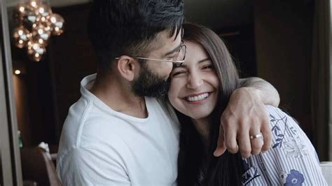 Virat Kohli kisses Anushka Sharma in adorable photo as daughter Vamika ...