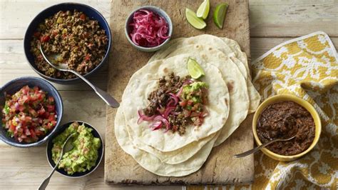 Homemade soft tacos with beef and black beans recipe - BBC Food