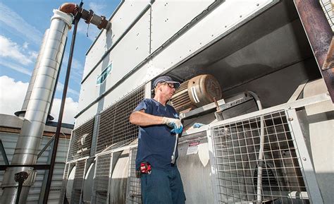 man working on cooling tower repair