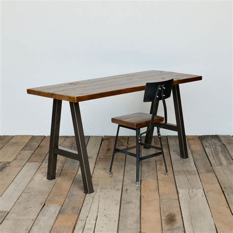 Reclaimed wood desk hand-crafted with steel A-frame legs in