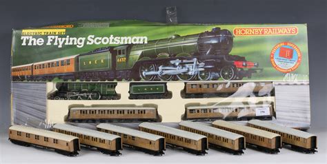 A Hornby Railways gauge OO R.869 The Flying Scotsman train set, boxed, and twelve LNER 'teak&#0