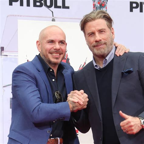 John Travolta asked Pitbull for permission to go bald - The Tango