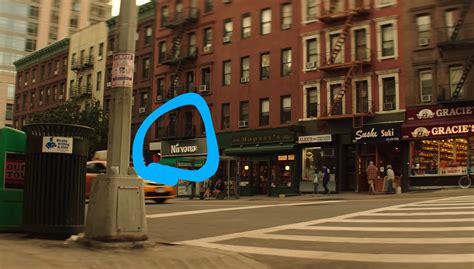 This is a photo of Joe's bookstore in Season 1. There's a place next to it called Nirvana, as ...