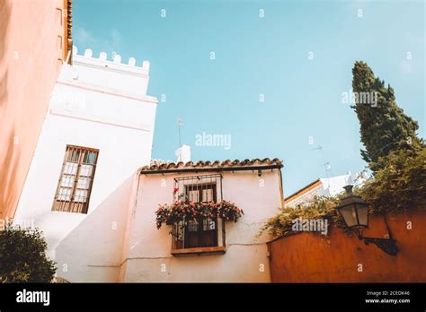 From below shot of beautiful balcony between two aged buildings on ...