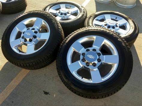 20" Chevy Silverado 2500 Polished OEM Wheels and Goodyear Wrangler SR-A Tires | 05801