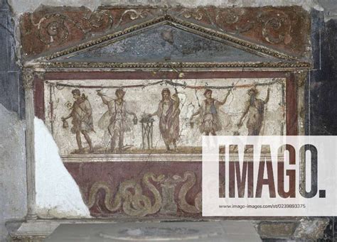 Pompeii. Lararium of the Thermopolium of Asellina. Frescoes depicting the Genius of the Pater Family