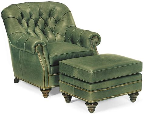 Green leather tufted armchair and ottoman