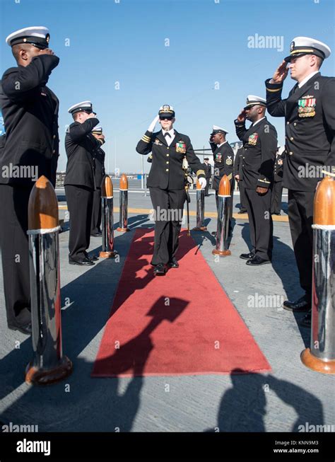 MIDWAY MUSEUM, Calif. (Dec. 01, 2017) CDR Danielle Defant salutes the ...