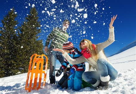 Family having fun on fresh snow at winter | royalty free image