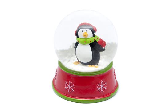 Photo of Cute little penguin in a snow globe | Free christmas images