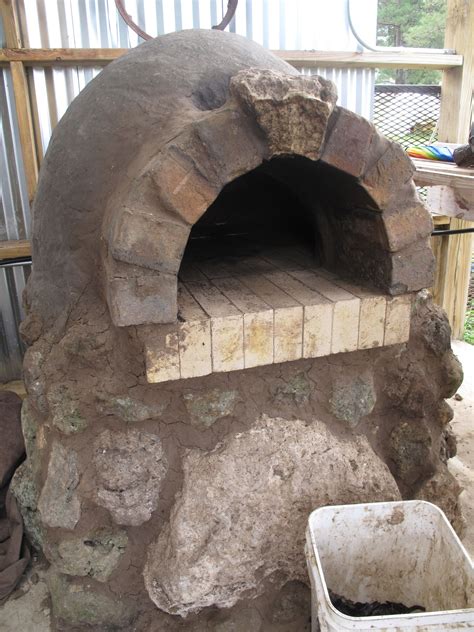 Outdoor Earth oven in construction. I was able to watch this being made ...