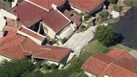 Evacuated homes continue sinking after massive landslide in Rolling ...