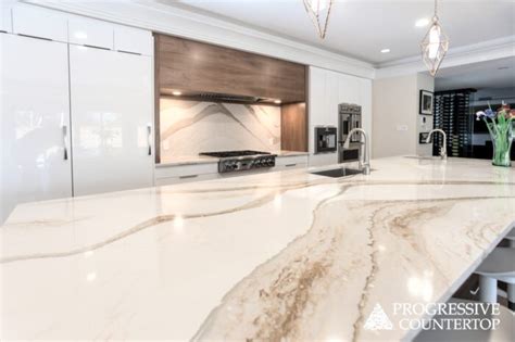 Cambria Quartz - Brittanicca Gold Kitchen Countertop and Backsplash - Progressive Countertop